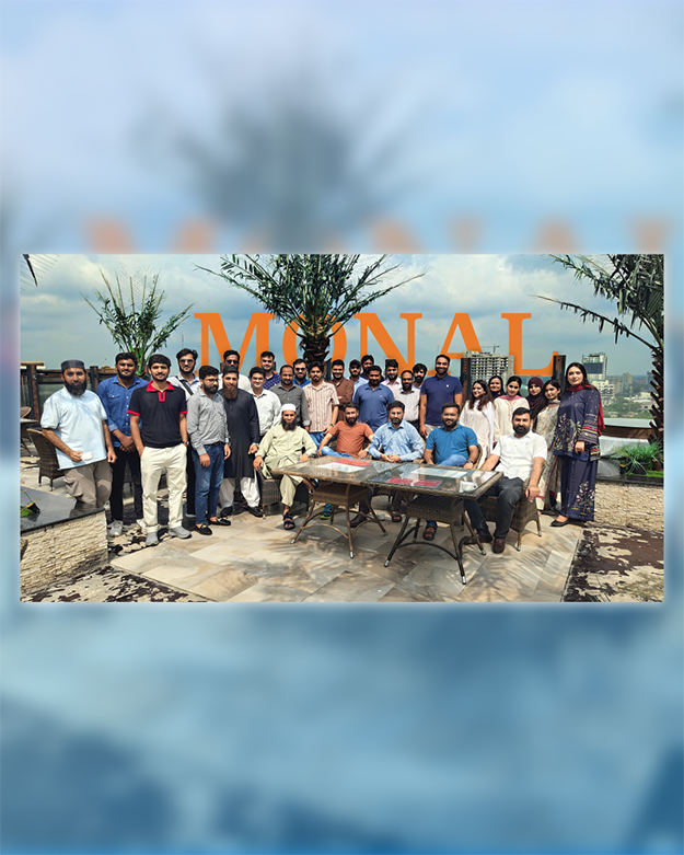 Team group photo at Monal rooftop